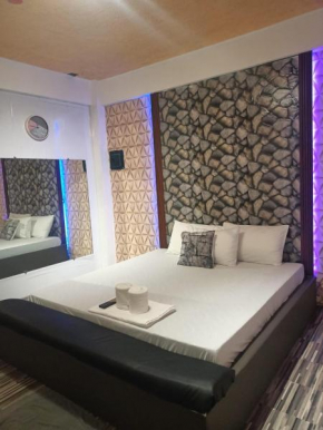 DJCI Apartelle Walk to Robinson & NE Pacific Mall 3 Min to SM Cabanatuan